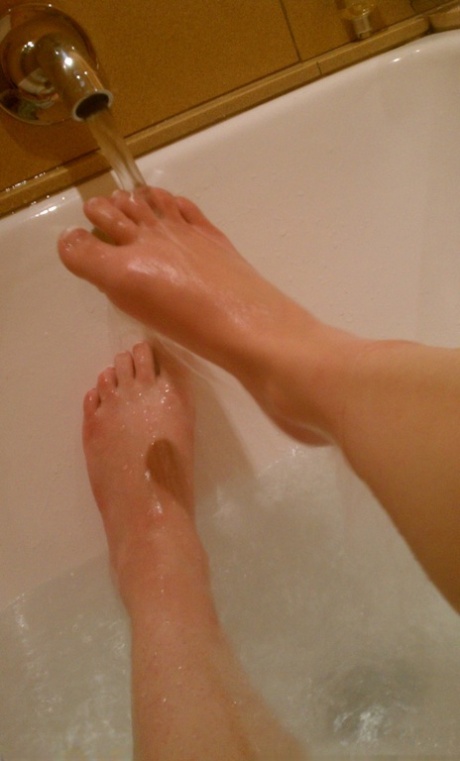 Blonde authentic Danielle takes artistic selfies during candid action