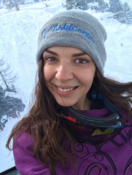 Russian young adult Alina Henessy takes artistic and non artistic selfies during the day