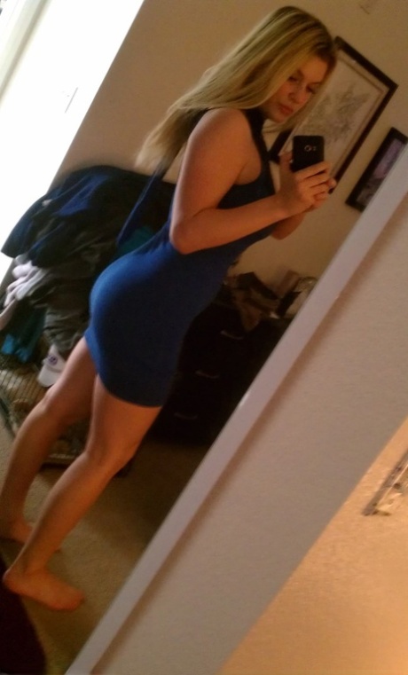 Blonde girl takes non artistic selfies in various places around her house