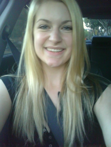 Blonde girl takes non artistic selfies in various places around her house