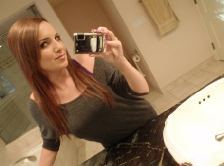 Sweet authentic chick takes artistic self shots of her young young adult breasts