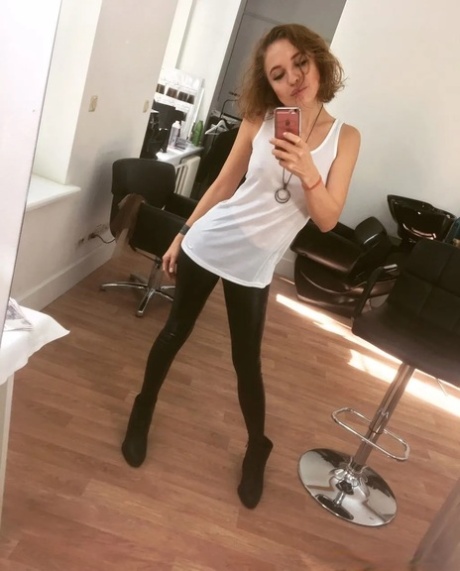 Alluring redhead takes artistic selfies showing her lovely breasts & her perfect curves