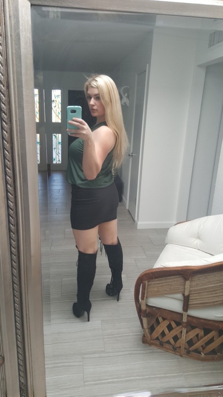 Blonde authentic Danielle takes a variety of artistic and non artistic self shots