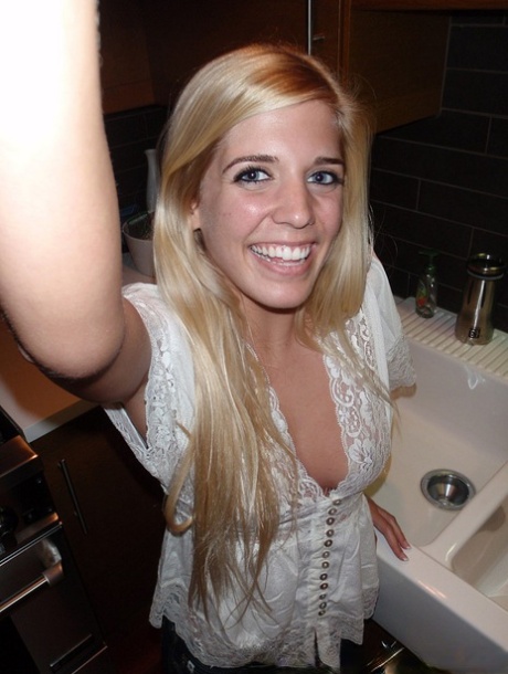 Young blonde girl takes artistic and semi-nude selfies during solo action