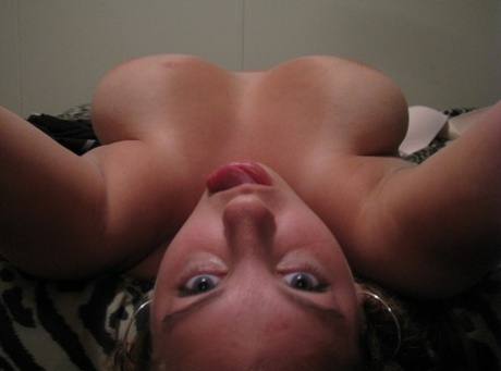 Chubby authentic shows her big breasts up close while taking artistic selfies