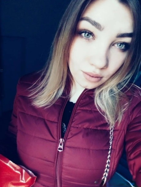 Dirty authentic babe holds her huge breasts and poses natural at her home