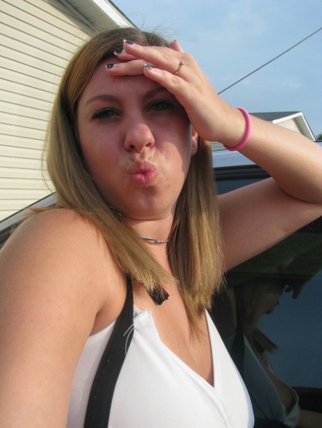 Dirty authentic young adult Nikki Morgan flaunts her cleavage in intimacy self shot photos