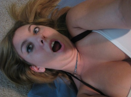 Dirty authentic young adult Nikki Morgan flaunts her cleavage in intimacy self shot photos