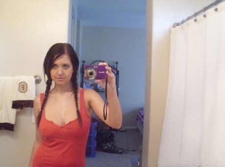 Busty ex-girlfriend plays with her creamy pussy while taking mirror selfies