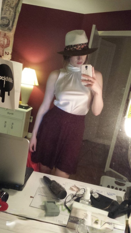 Solo girl Gemma Minx takes selfies in various states of undress