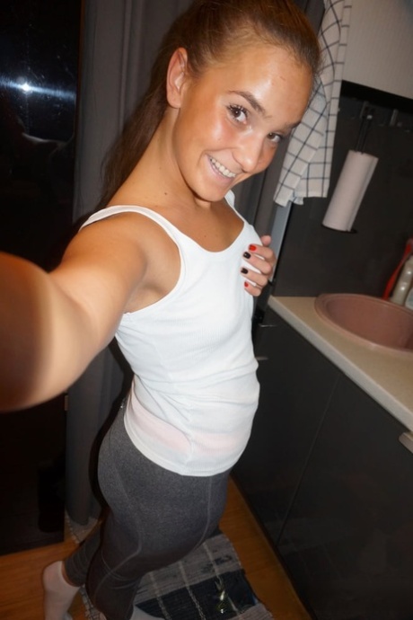 Amateur girlfriend fondles her tits & poses in stockings in homemade action