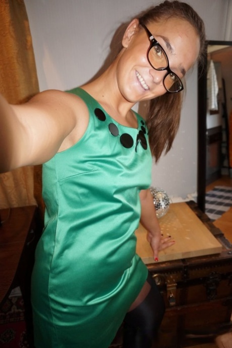 Amateur girlfriend fondles her tits & poses in stockings in homemade action