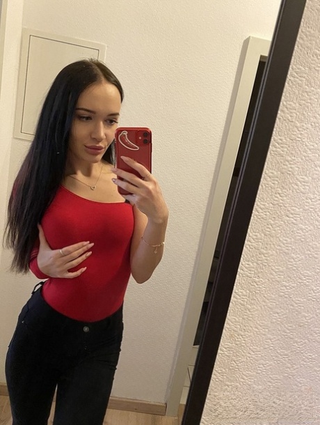 Dark-haired amateur Sasha Sparrow takes selfies of her big booty as she strips