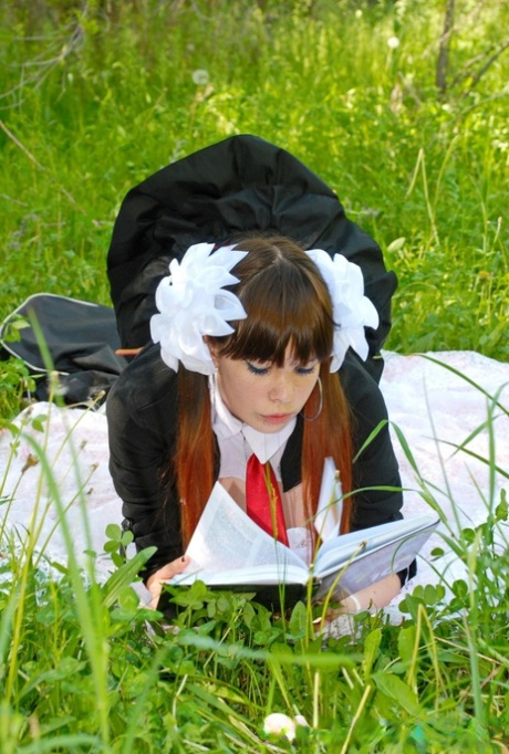 18-year-old schoolgirl peels on a blanket outdoors & shows her big ass & holes