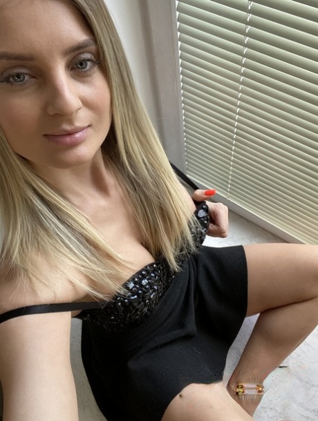 Blonde pornstar with firm tits Imanuela flaunts her incredible figure