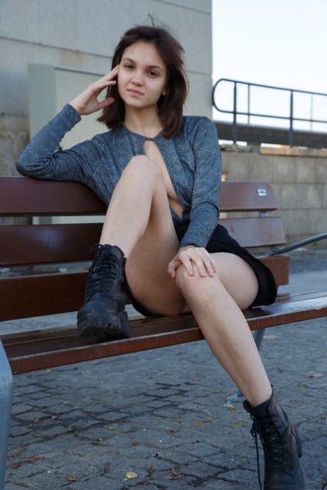 Foxy young adult Lara Maiser revealing her alluring body and sensitive tattooed feet