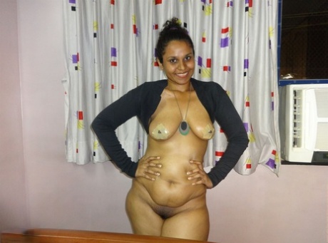 Fat Indian chick flaunts her big boobs during a live webcam show