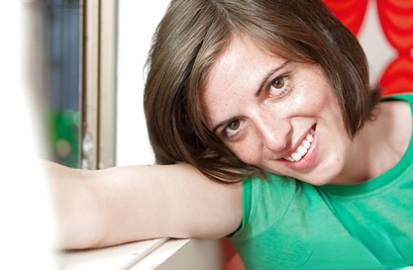 First timer Leona showing off all natural tits and hairy vagina