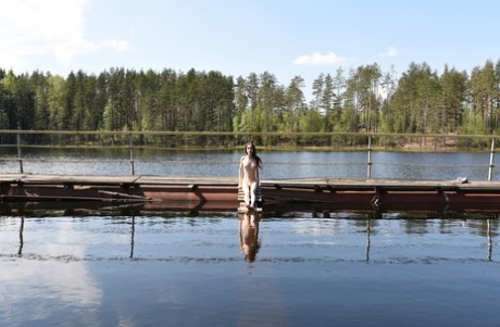 Glamorous teen Pala strips to show her very skinny body by the lake