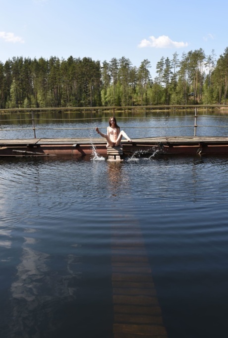 Glamorous teen Pala strips to show her very skinny body by the lake