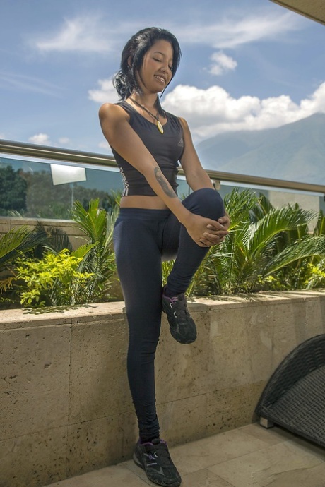 Latina young adult Carol Lopez peels off spandex pants on way to shower masturbation