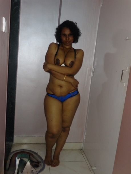 Chubby Desi solo girl releases her breasts from bra before flashing some curves
