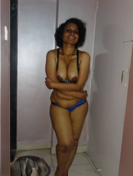 Chubby Desi solo girl releases her breasts from bra before flashing some curves