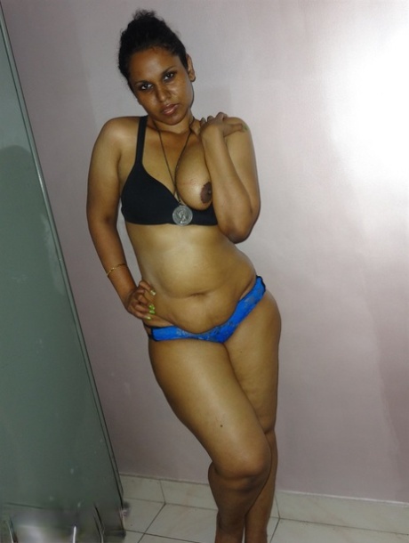 Chubby Desi solo girl releases her breasts from bra before flashing some curves