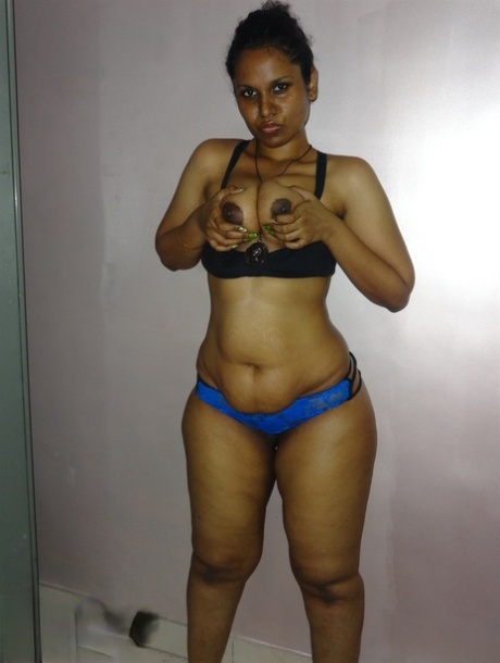 Chubby Desi solo girl releases her breasts from bra before flashing some curves