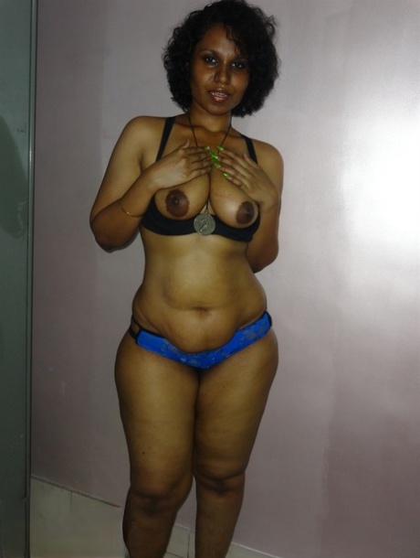 Chubby Desi solo girl releases her breasts from bra before flashing some curves