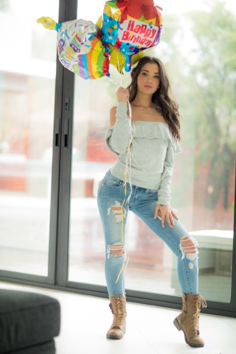 Brunette American babe Gia Paige strips and exposes her alluring white panties